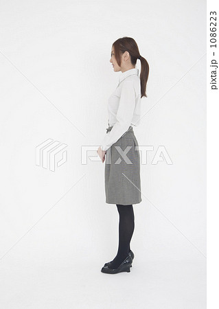 Ol 女性 横向き タイツの写真素材