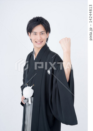 成人式 和服 ガッツポーズ 男性の写真素材