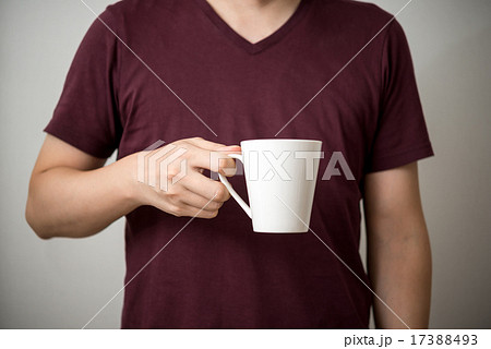 マグカップ 手 コーヒー 男性の写真素材