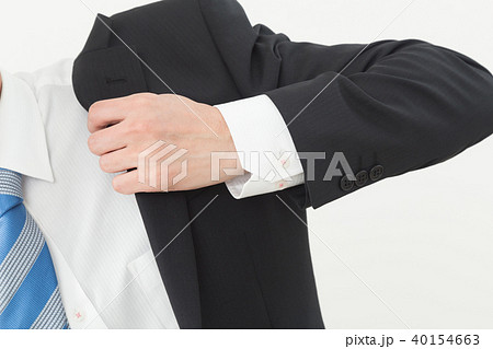 男性 スーツ ジャケット 羽織るの写真素材