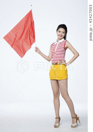 旗 フラッグ フラグ ポーズの写真素材