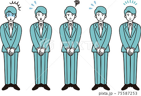 イケメン 男性 立ちポーズ スーツの写真素材
