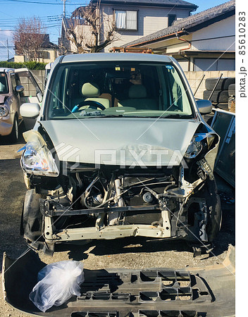車 事故 大破 軽自動車の写真素材