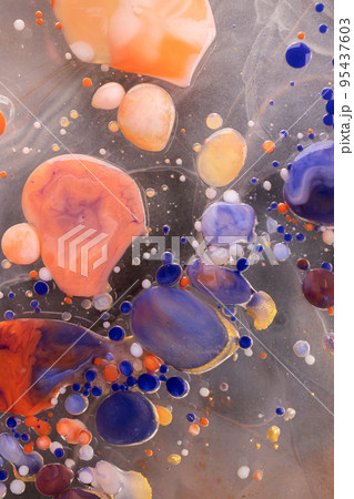 Acrylic paint balls abstract texture. Bright colors fluid, flowing