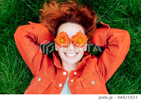 Hairdresser with Colored Afro Braids Weaves Ginger Dreadlocks