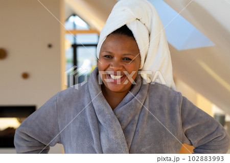 Happy plus size african american woman wearing - Stock Photo
